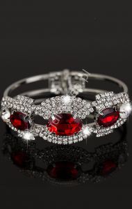 Posrebrzana bransoletka z kryształkami i dużymi czerwonymi cyrkoniami